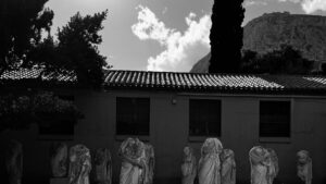 Headless Roman togati lining the courtyard wall of the Archaeological Museum of Ancient Corinth