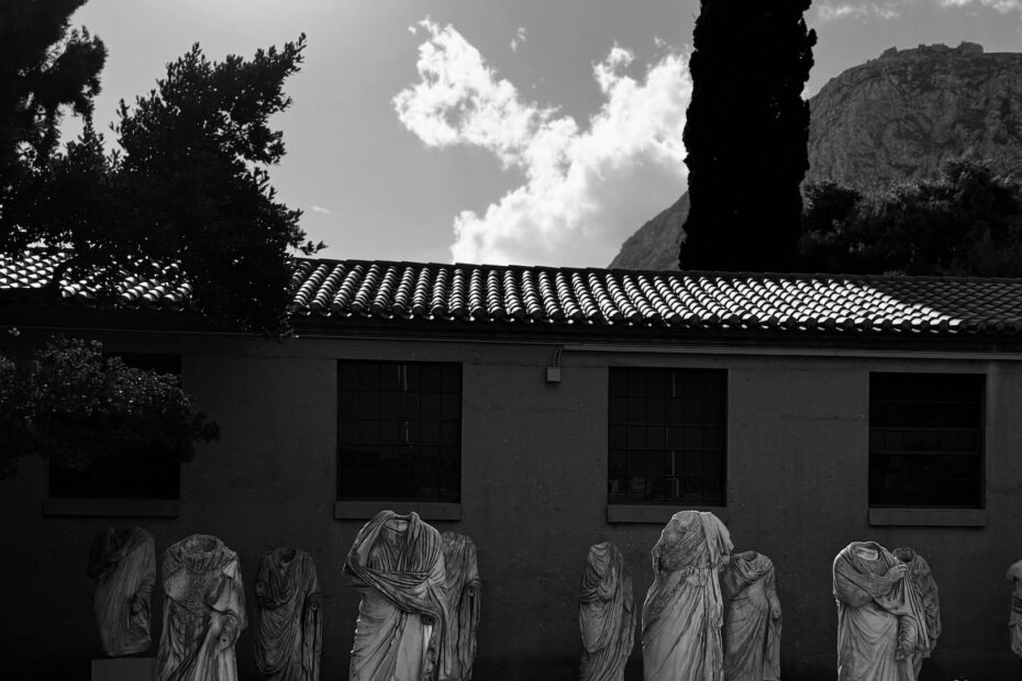 Headless Roman togati lining the courtyard wall of the Archaeological Museum of Ancient Corinth